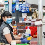 Photo of woman working in supermarket