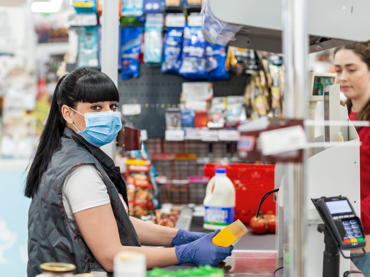 Photo of woman working in supermarket