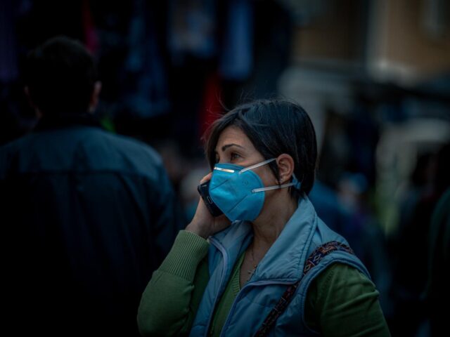 Photo of woman in covid mask