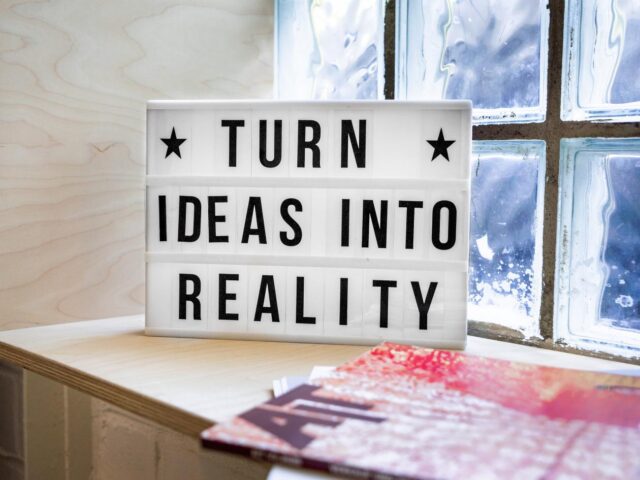Photo of text turn ideas into reality