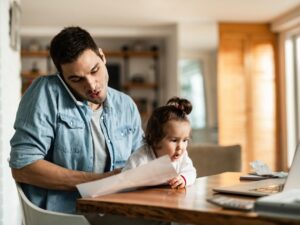 Photo of man working from home