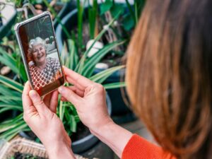 Photo of women video calling a relative