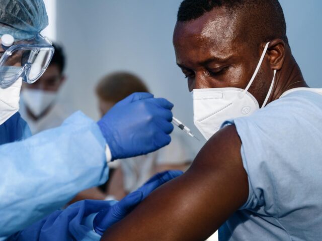 man receiving vaccine