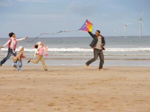 Photo of family on the beach