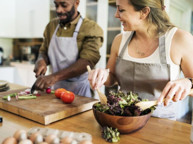 Photo of couple cooking
