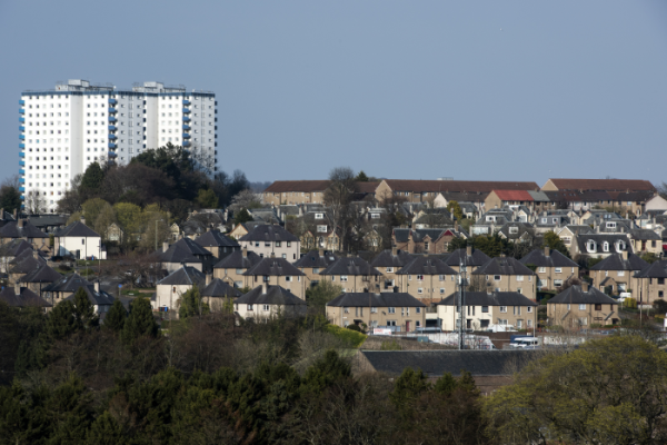 a range of housing against the sky